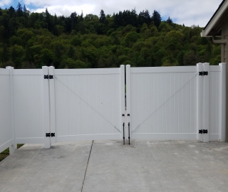 residential 6ft privacy vinyl double swing gate.