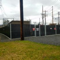 Commercial, privacy, slatted fence around PUD substation